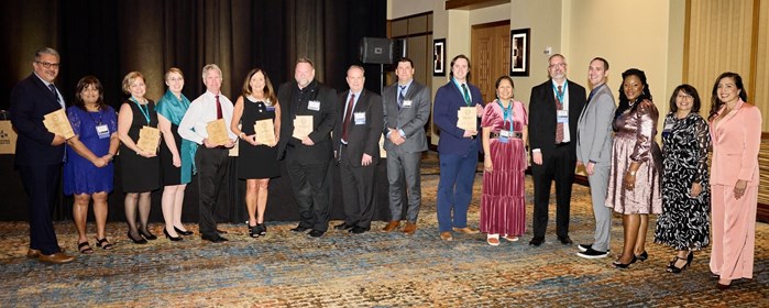 Arizona K12 Center board members stand with representatives from the school districts honored at the 15th Annual Celebration of Accomplished Teaching for their significant financial commitment to National Board Certified Teachers.